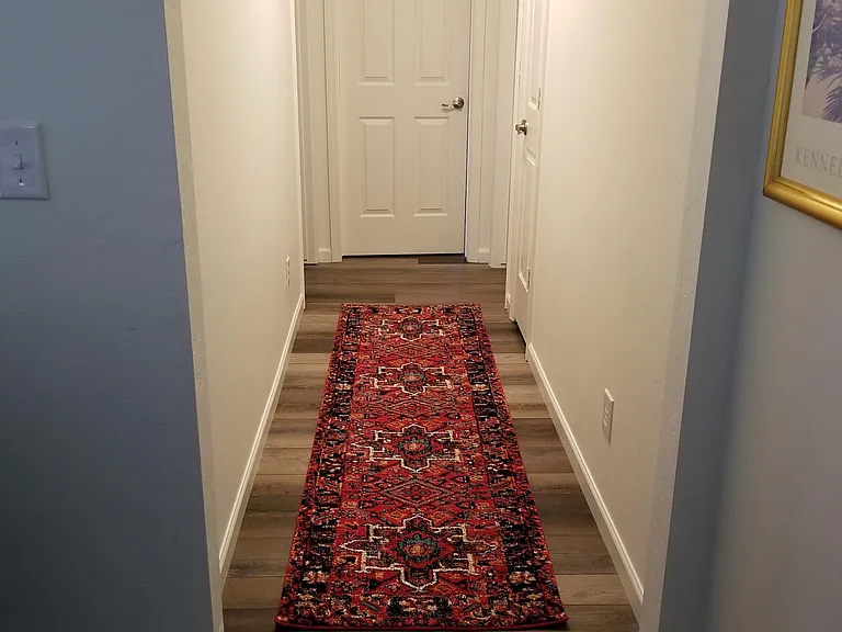 Hallway to bedrooms and bathrooms