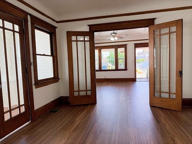 Dining room encased in 100 year old walnut trim