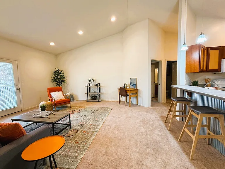 Serve-over bar on the right, Private Deck to the left (Maplewood 3 BR, staged)