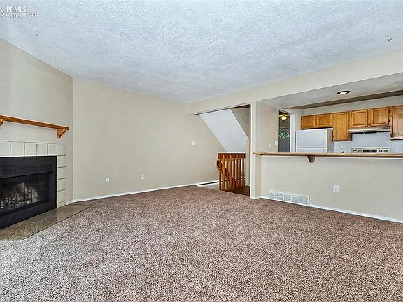 Kitchen has counter top bar for quick meals!