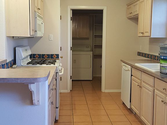 Galley kitchen with pantry