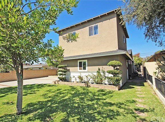 Stone pathway to the side of the home