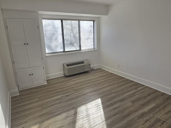 Bedroom with built-in closet.