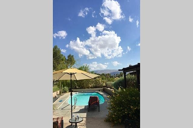 Pool overlooking golf course