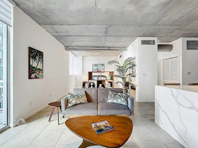 Living room with slider to balcony