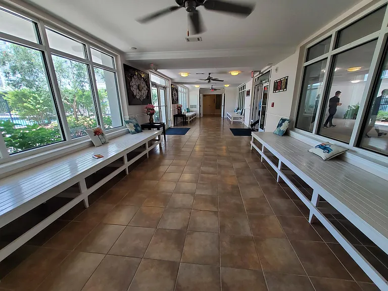 airconditioned seating area in first floor beside the pool