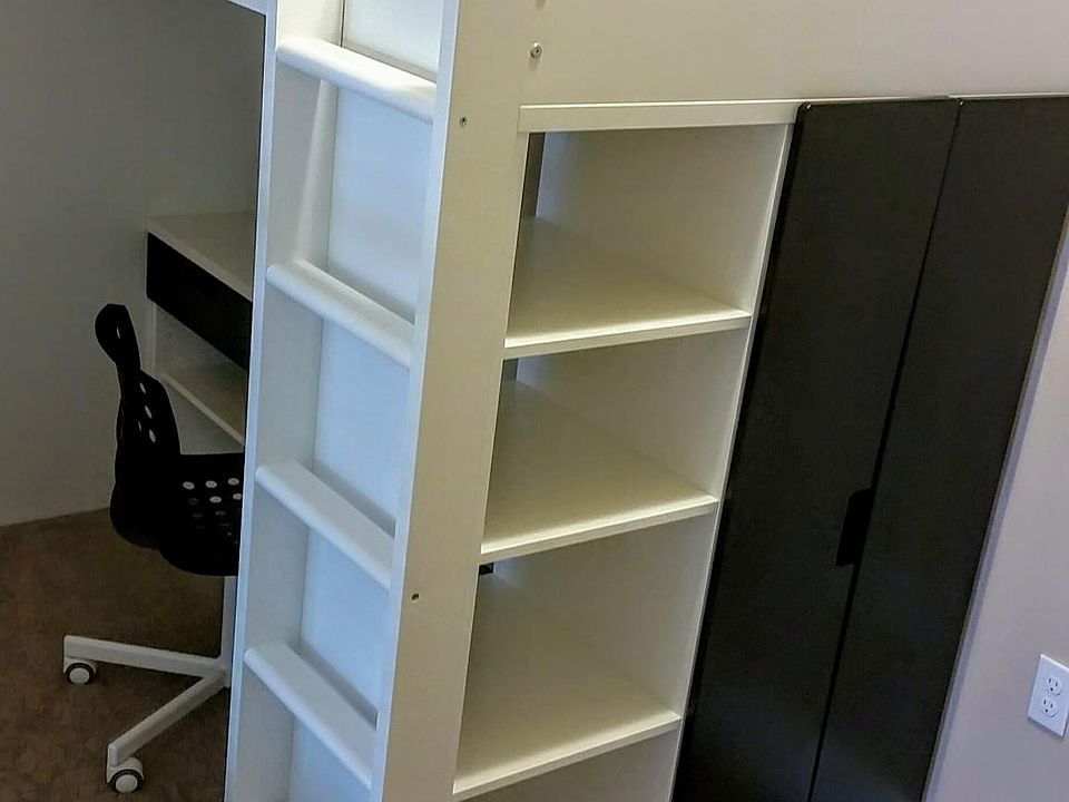 Bedroom 'A' loft bed with desk underneath and built-in shelving & closet