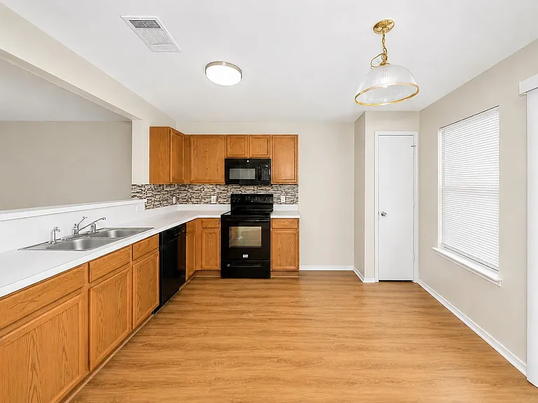 7120 Planters Row Dr — Photo 30