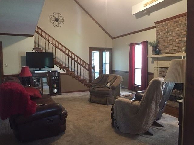 Great Room : View from kitchen. Double doors lead to sunroom and out to deck.