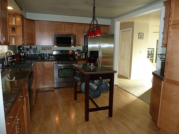 stylish remodeled kitchen, stainless steel, granite, pantry