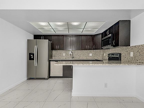 3rd image of 8706 W Sample Rd APT 4