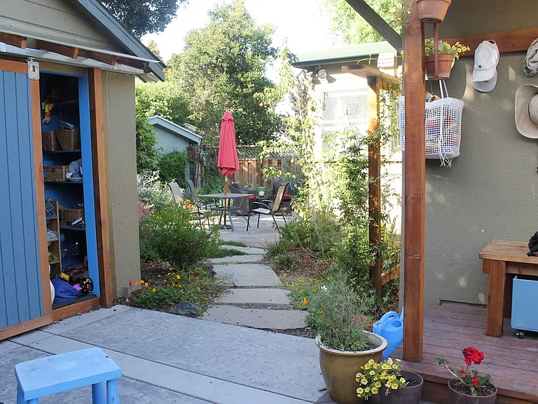 View from the side yard into the backyard