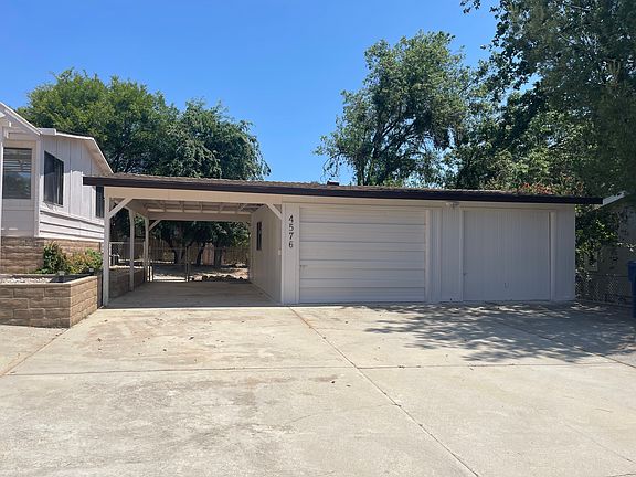 Two garages with additional storage inside the garage.