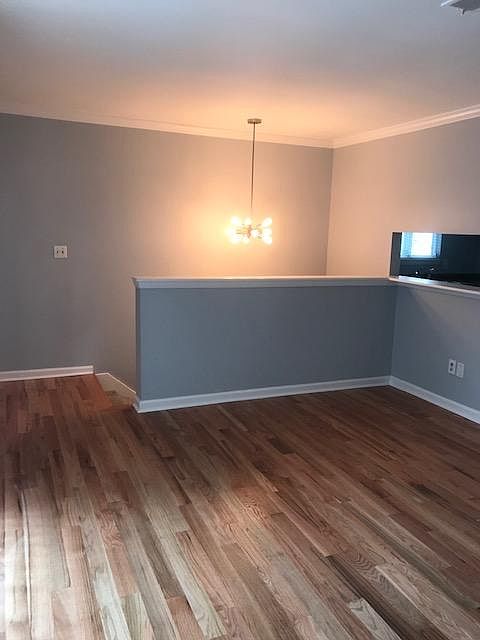 Brand new hardwood floors, fresh paint and new lighting!