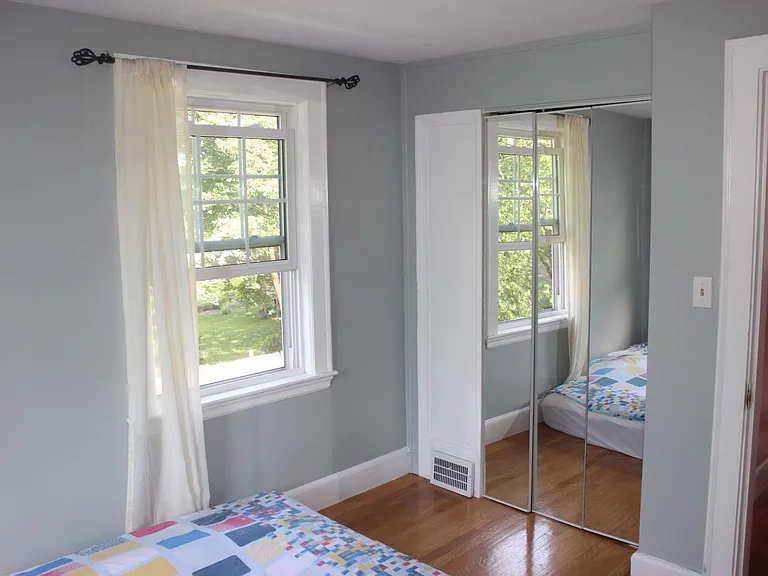 Guest bedroom can fit kind size bed.