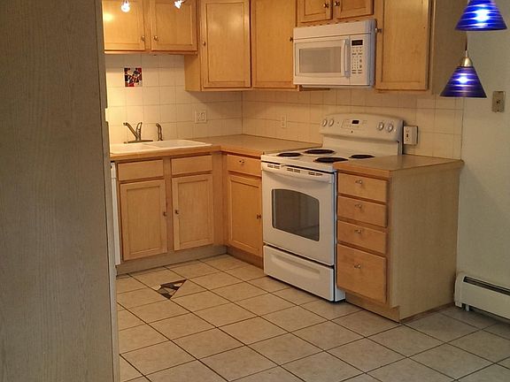 Open, modern kitchen and eating area