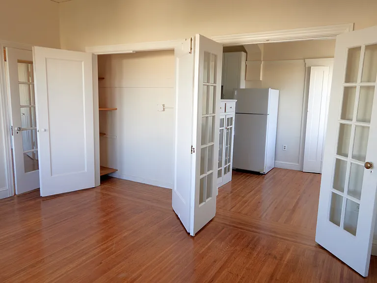 Living room - opened closet and French doors