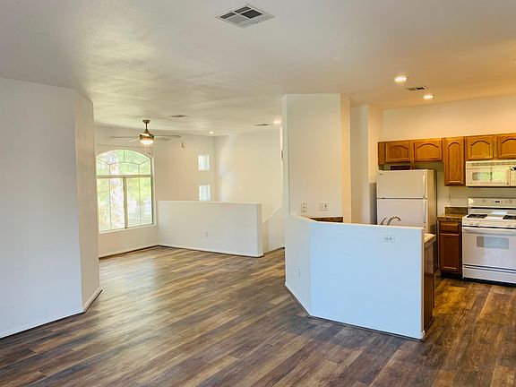 Open concept kitchen, dining room, and living room