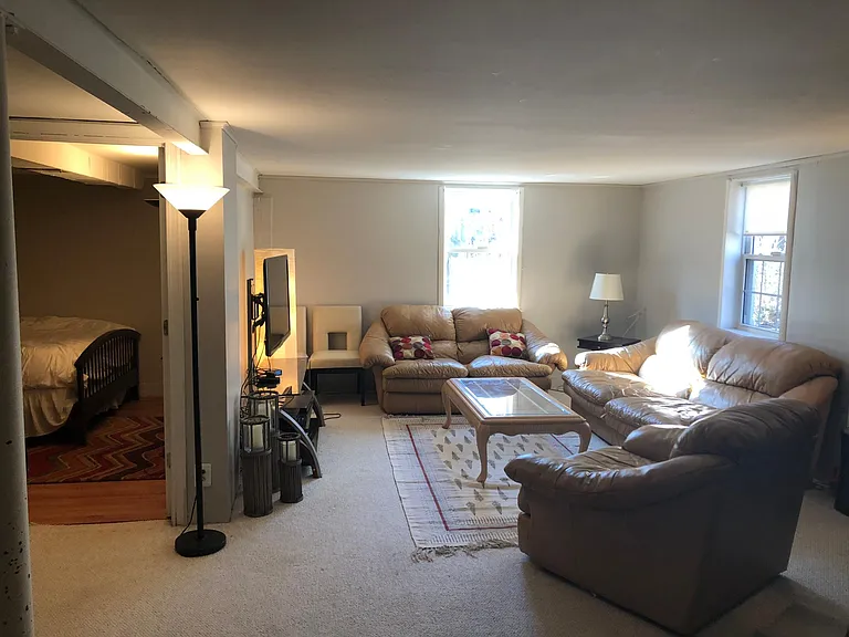 Lower level: Guest room, full bath, office, spacious living area.
Large laundry, large storage space.