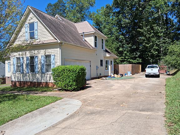 6 car driveway w 2 car garage.