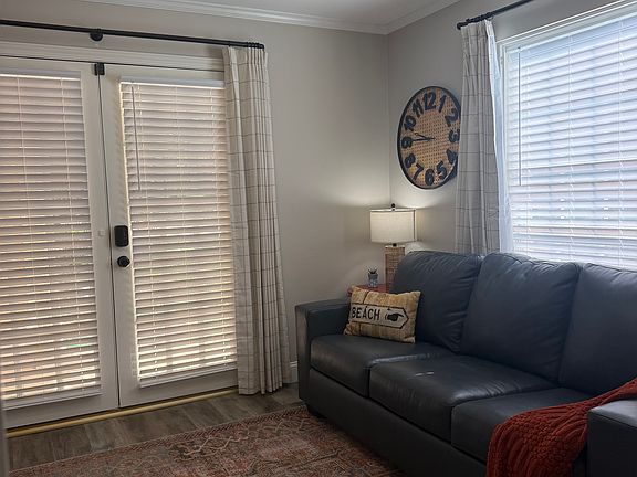 Private Double Door Entry into Apartment Living Room