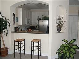 Arched Opening from Living Room to Kitchen