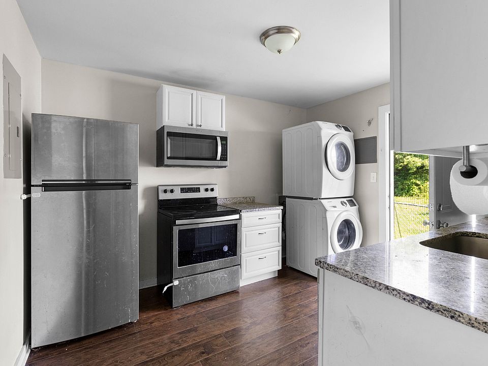 Kitchen with In-unit laundry and back door entry
