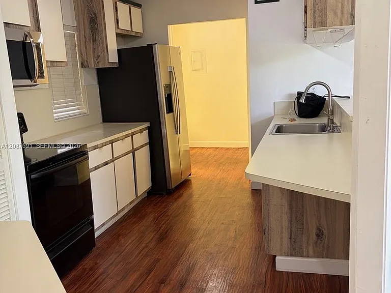 3100 N Pine Island Rd #209 — Photo 28