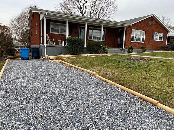 Left side Duplex with large driveway