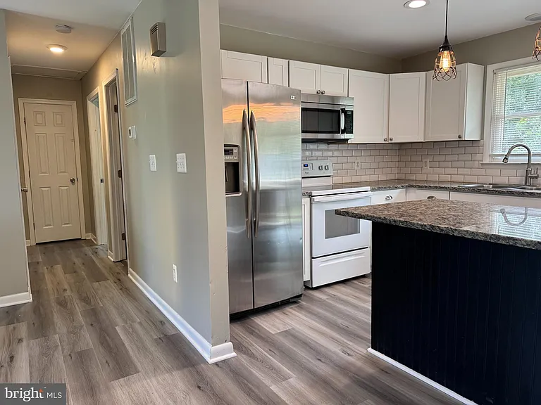 5077 Macnamara Dr — Photo 3