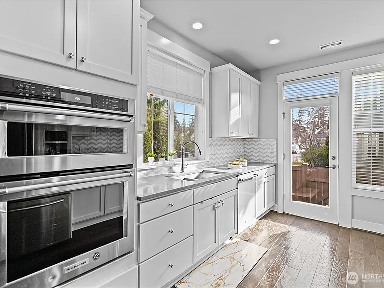 Kitchen with stainless steel appliances and gas range