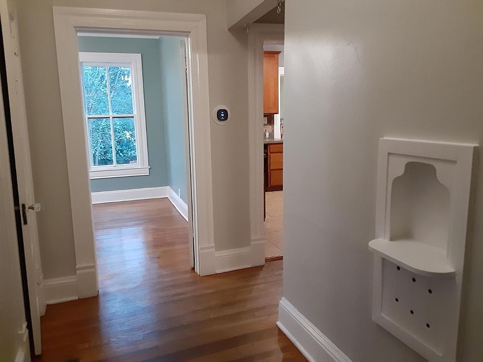 Hallway Looking into Bedroom and Kitchen