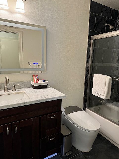 Hallway restroom to be shared with the other hallway bedroom tenant( male student of UCSD). New bidet toilet. LED vanity mirror.