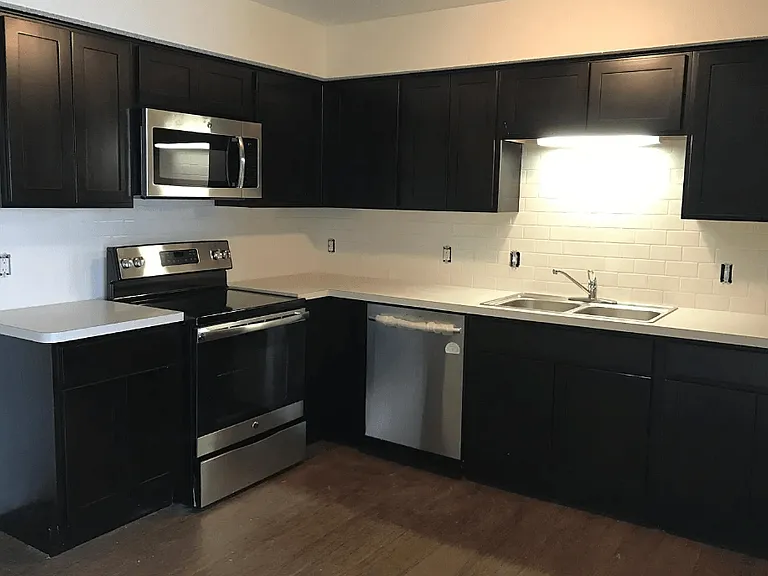 Upgraded kitchen finishes available in select units only