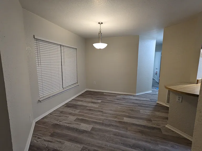 Dining Area to Hallway to Bedrooms and 2nd Bathroom