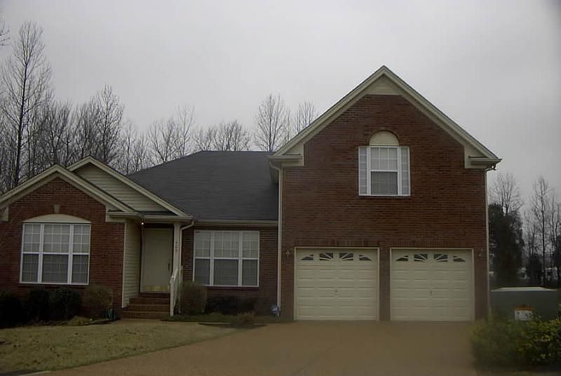 Brick Front, Two Car Garage, Mature Landscaping