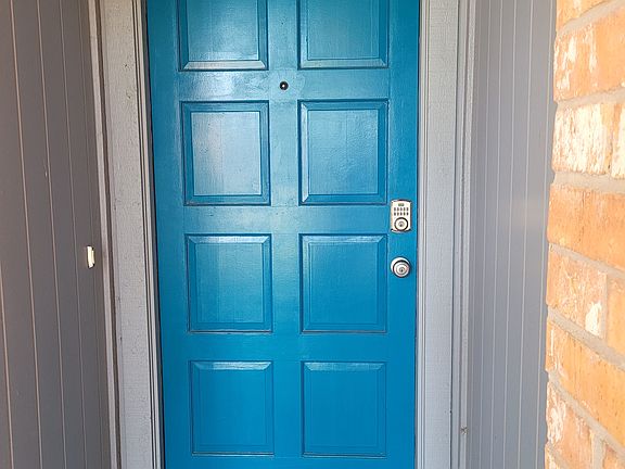 Front door with electronic door lock.