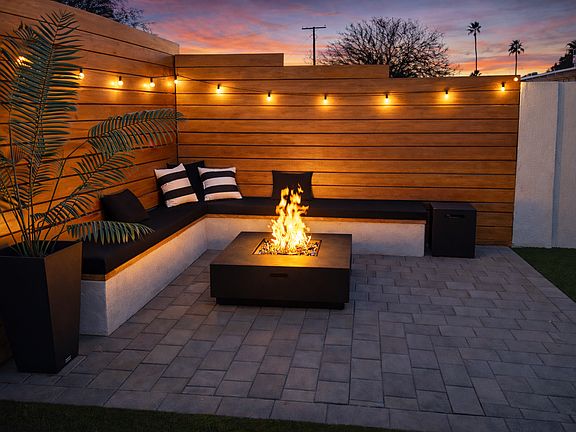 Custom built-in gas firepit with seating up to 8 guest. Propane included