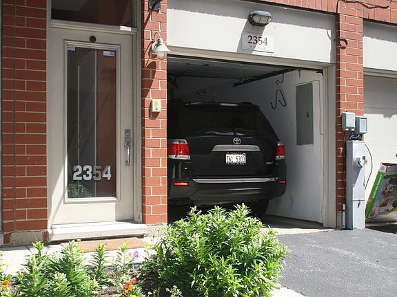 Front Door & Attached Garage