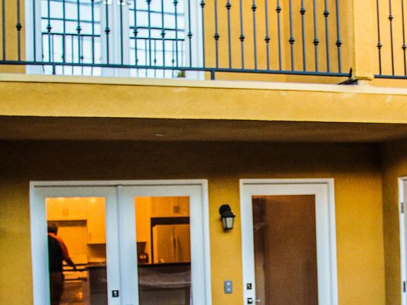 Entry to living room & bedroom balcony