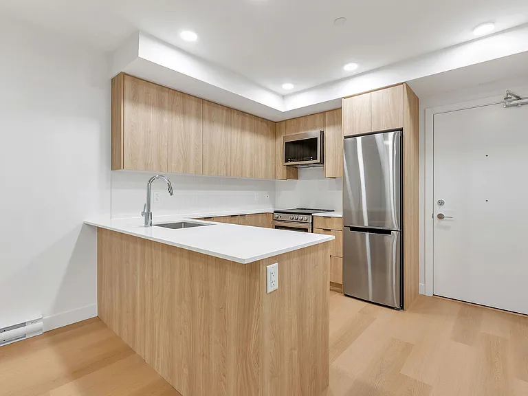 1490 W 32nd Ave — Photo 16