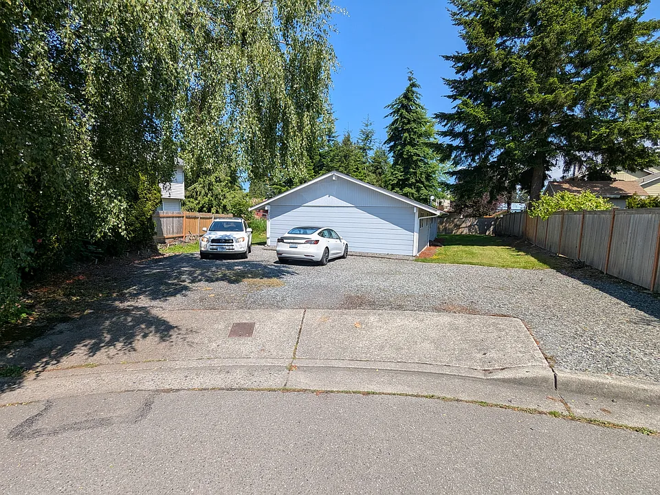 2 dedicated parking spots in lot, additional street parking for guests.
