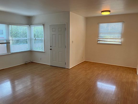 Bright and Sunny Living Room and Dining Area
