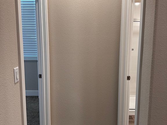 Downstairs bedroom with private bathroom.