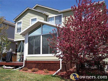 Back of home w/sunroom