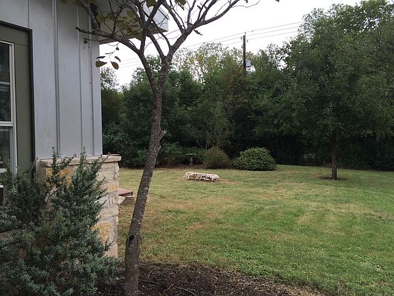 view of the side yard from the front of the house