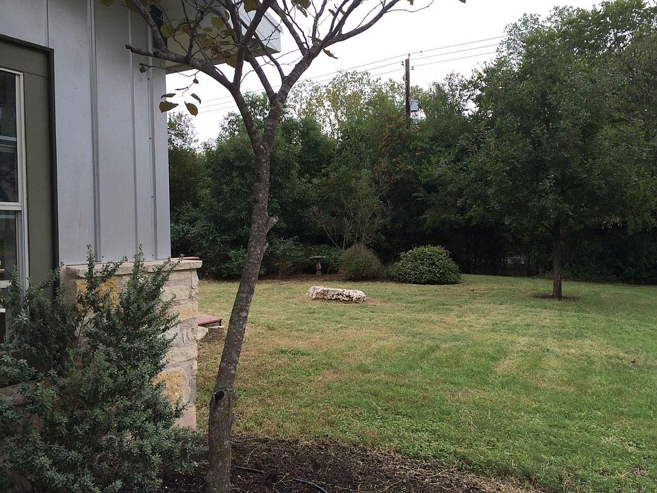 view of the side yard from the front of the house