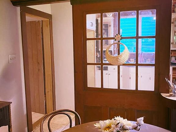 Part of kitchen/living/dining area.