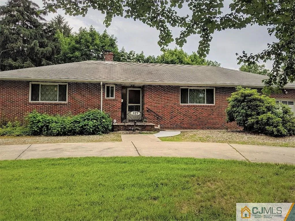 327 Manalapan Rd photo 1