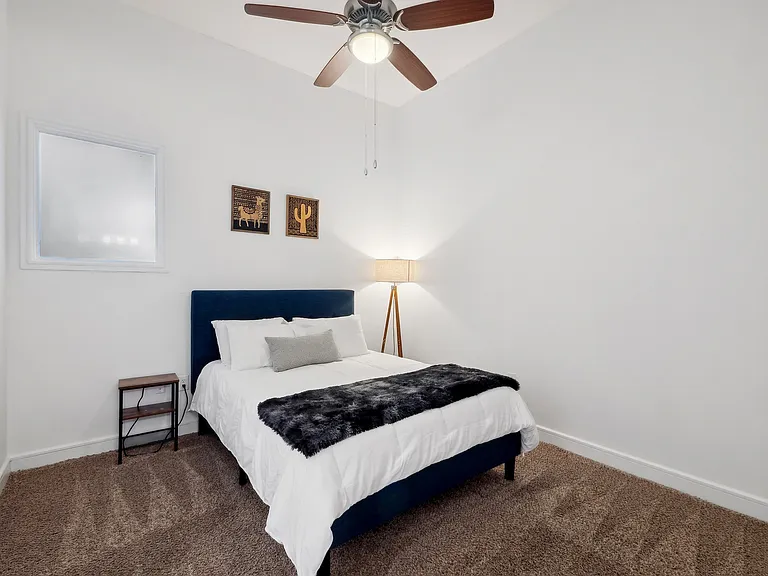 Experience comfort and style in this inviting bedroom retreat, featuring modern design and serene ambiance. Experience comfort and style in this inviting bedroom retreat, featuring modern design and serene ambiance.